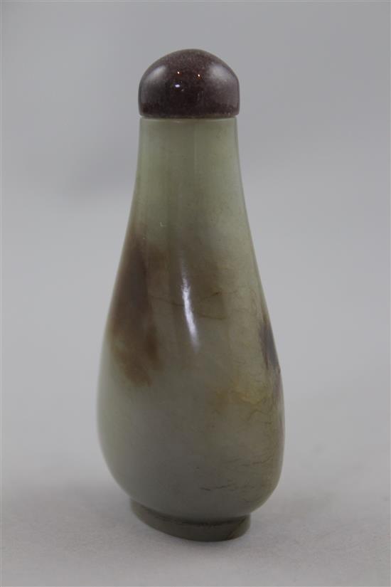 A Chinese celadon and brown jade pear shaped snuff bottle, 1750-1850, 6.1cm